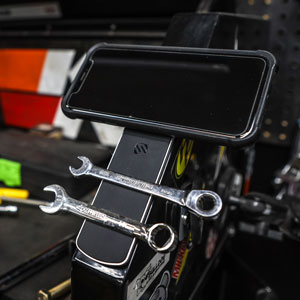 Graphic image of magicmount Bar mount with tools and phone image 2