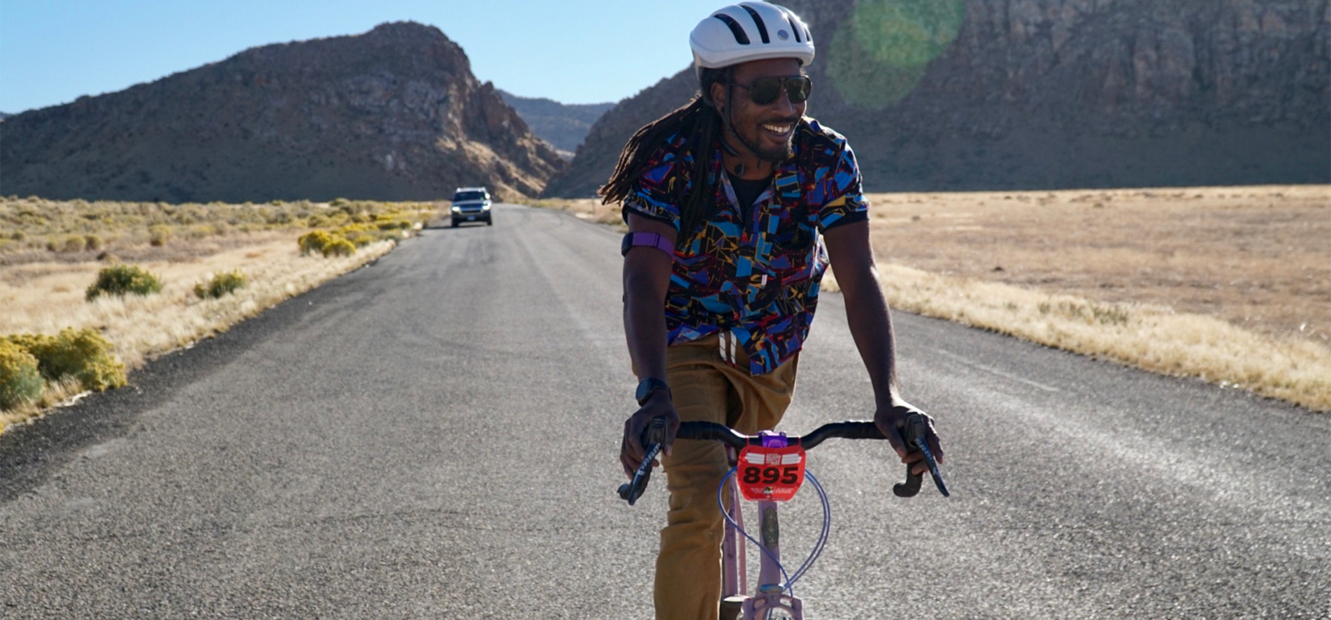 men riding bike