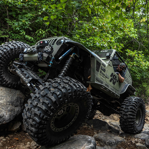 Image of men in offroad vehile